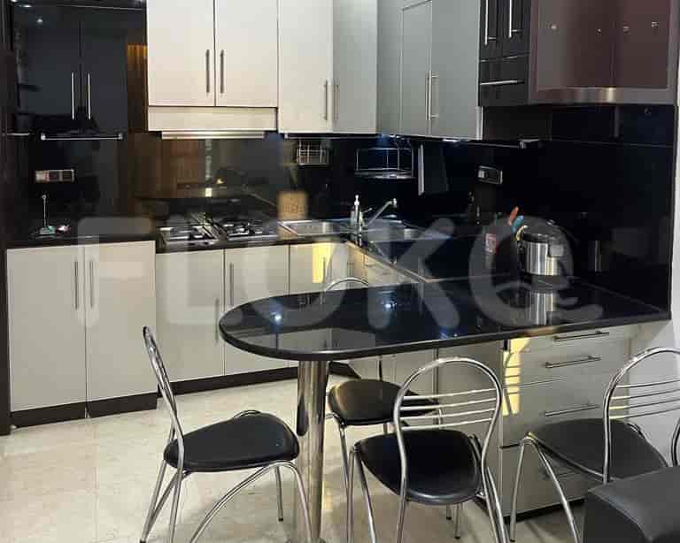 A modern kitchen with a breakfast bar.
