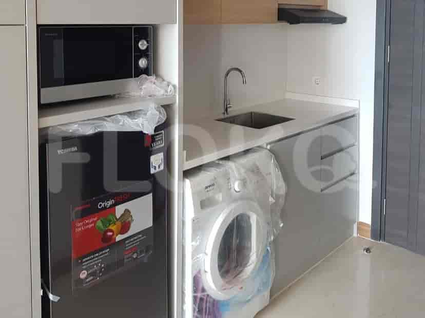 Kitchenette with appliances.