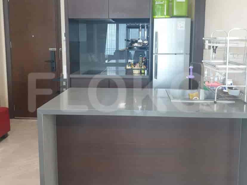 A kitchen with cabinets and appliances.