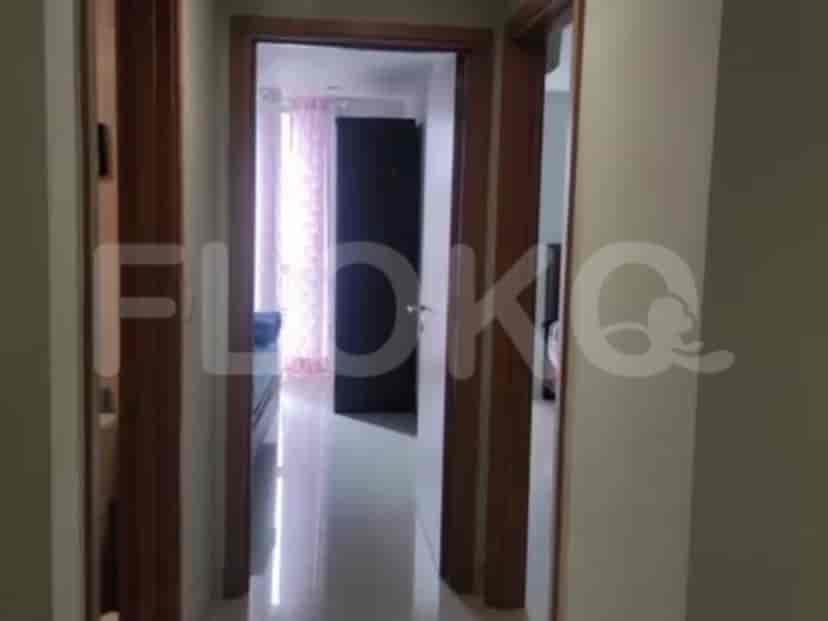 Hallway leading to different rooms.