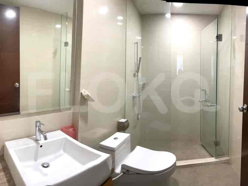 Contemporary bathroom featuring a glass-enclosed shower and modern fixtures.