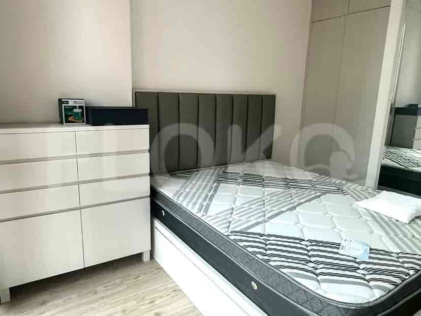Bedroom featuring a bed and storage.