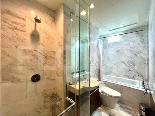 Bathroom featuring a shower, bathtub, and sink.