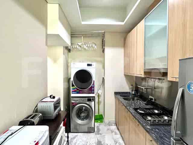 Kitchen featuring appliances and storage cabinets.