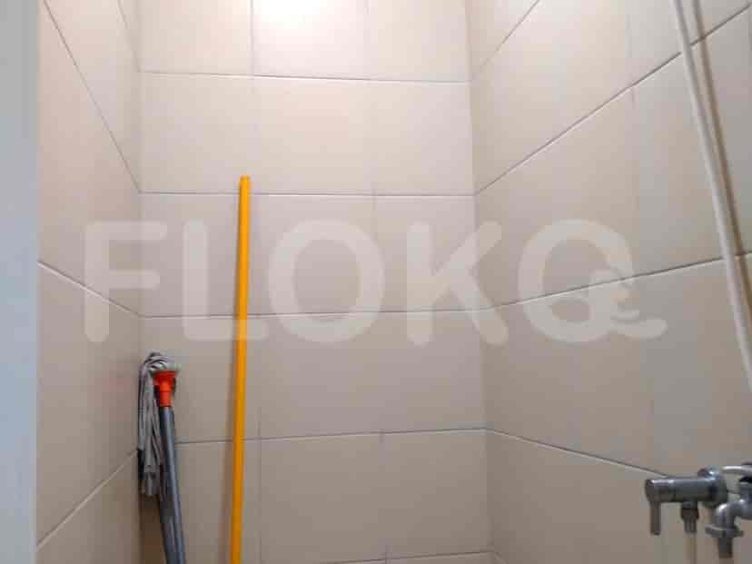 A spacious bathroom with a shower.