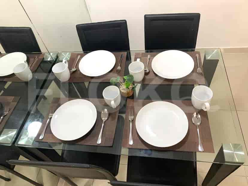 Close-up of a dining table set for a meal.