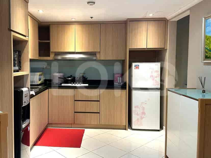 Modern kitchen with wooden cabinets.