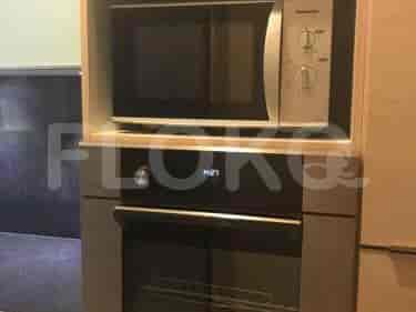 A well-equipped kitchen with modern appliances, including a microwave and oven.