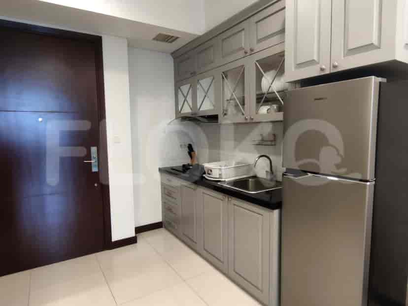 Kitchen with cabinets, appliances, and a sink.