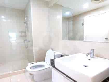 Modern bathroom with a sink and shower.