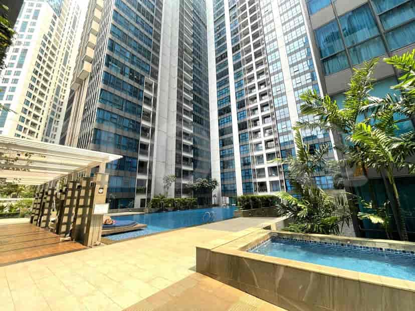 The exterior view shows a pool.