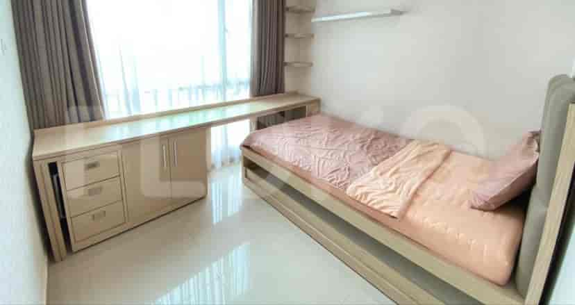 Elegant master bedroom with a king-sized bed, modern lighting, and stylish decor.
