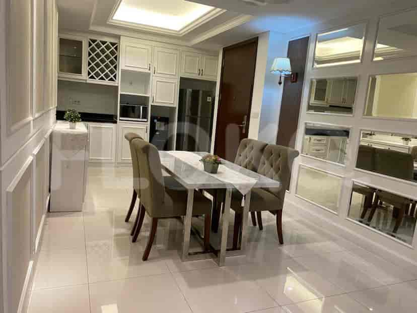 Dining and kitchen combo with a modern aesthetic.