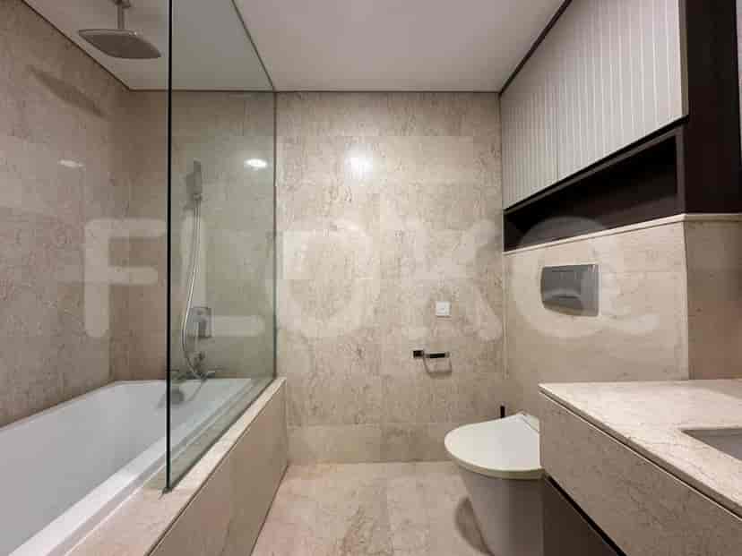 Bathroom with a bathtub and walk-in shower.