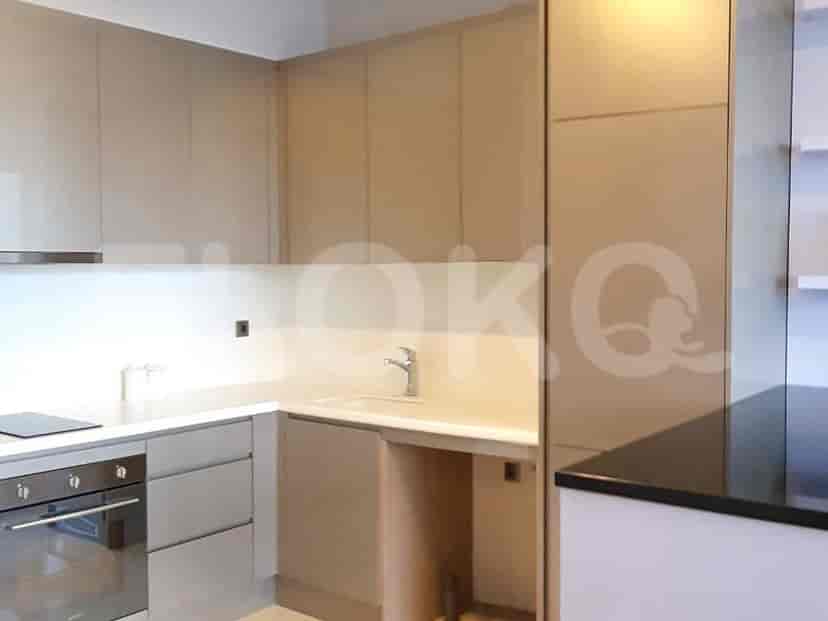 Bathroom with a large mirror and modern fixtures.