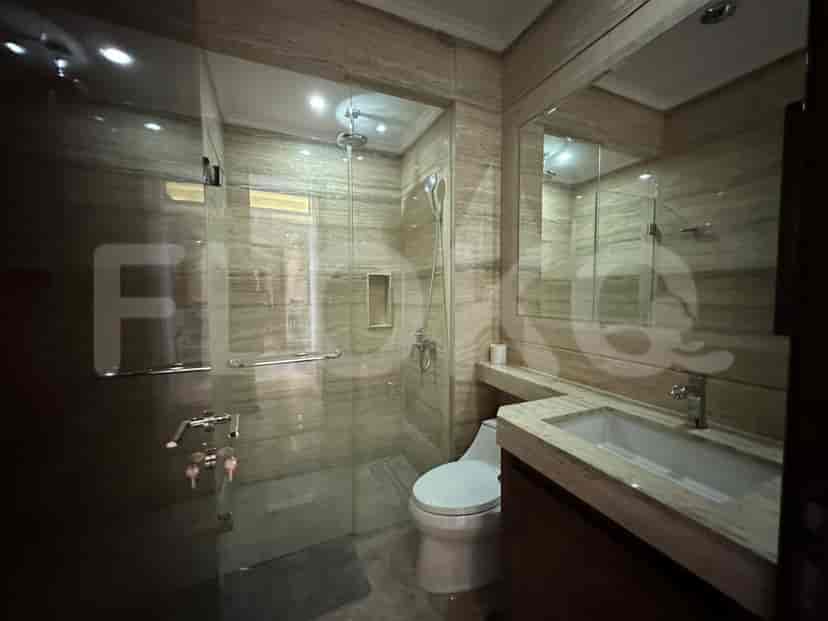 Modern bathroom with a glass shower and a sink.