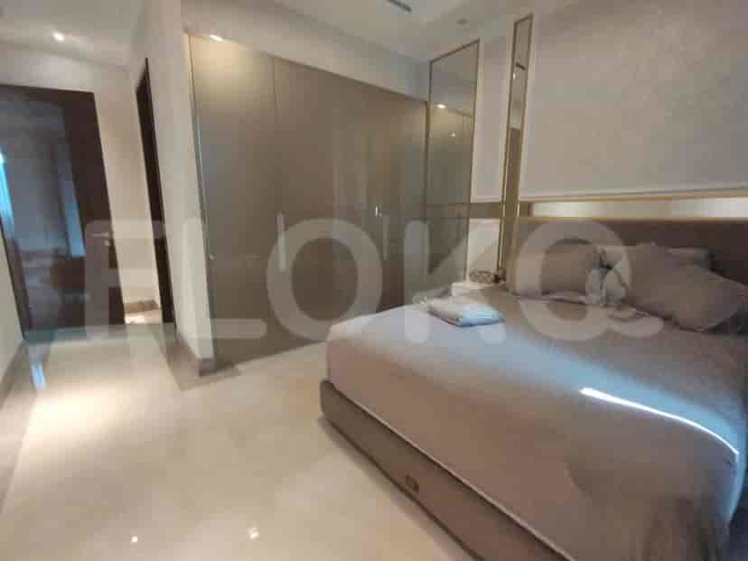 Bedroom featuring a bed, large closet, and a neutral color palette.