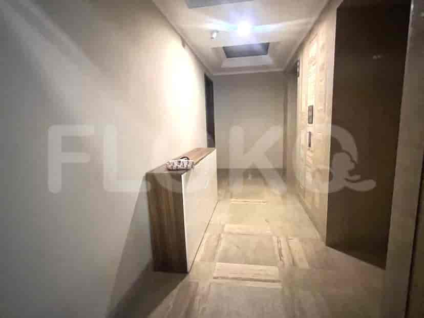 Hallway with a cabinet.