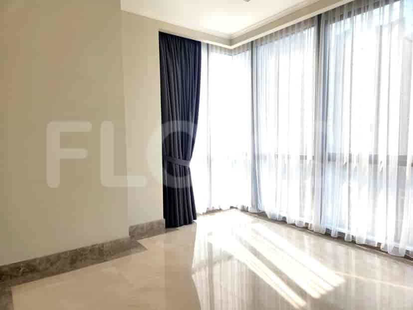 Living room with marble flooring, windows and curtains.