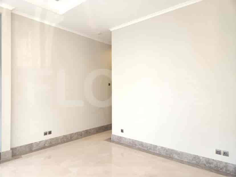 Hallway with marble flooring and lights.