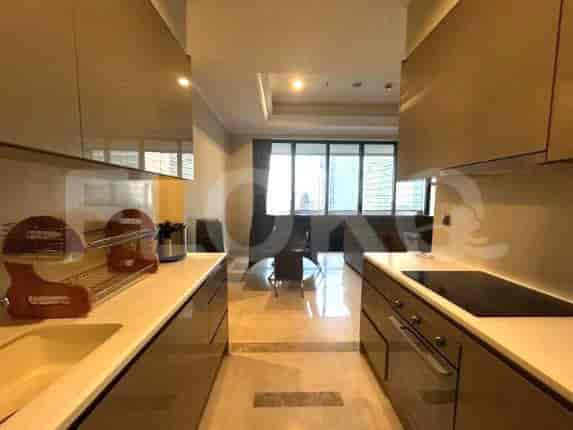 Kitchen featuring modern design with white countertops and city view.