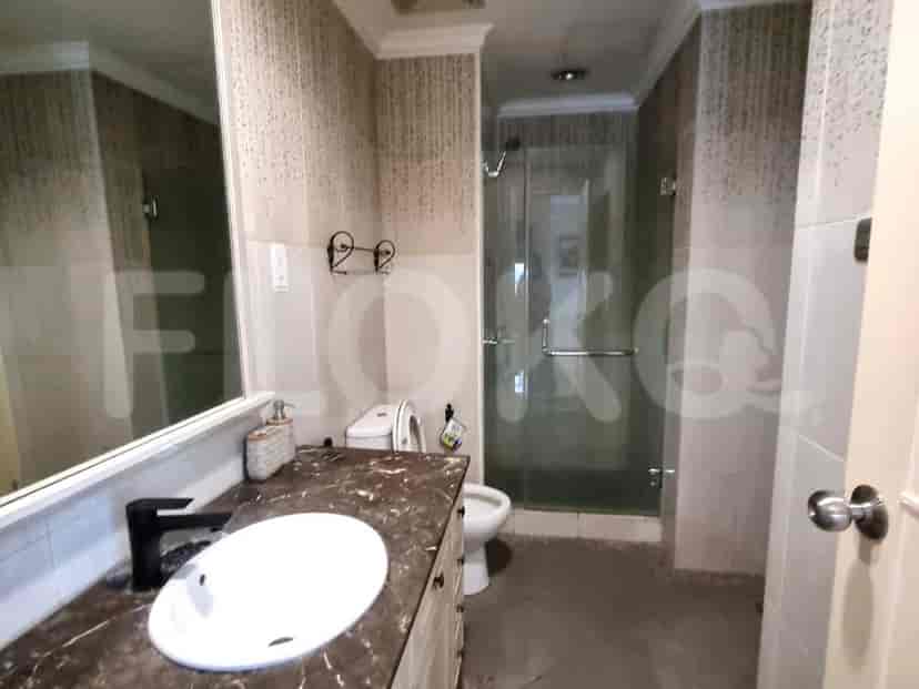 A bathroom with a sink, toilet and shower.