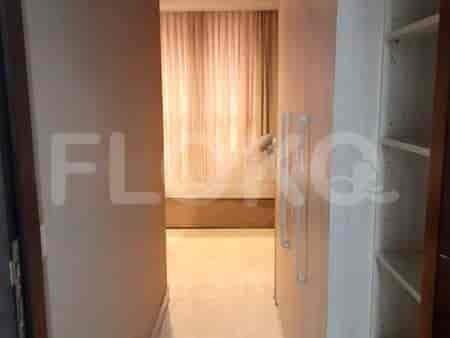 Hallway leading to the bedrooms, with white walls and a contemporary design.