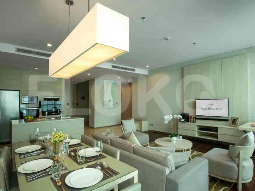 An open-plan living and dining area with a kitchen.