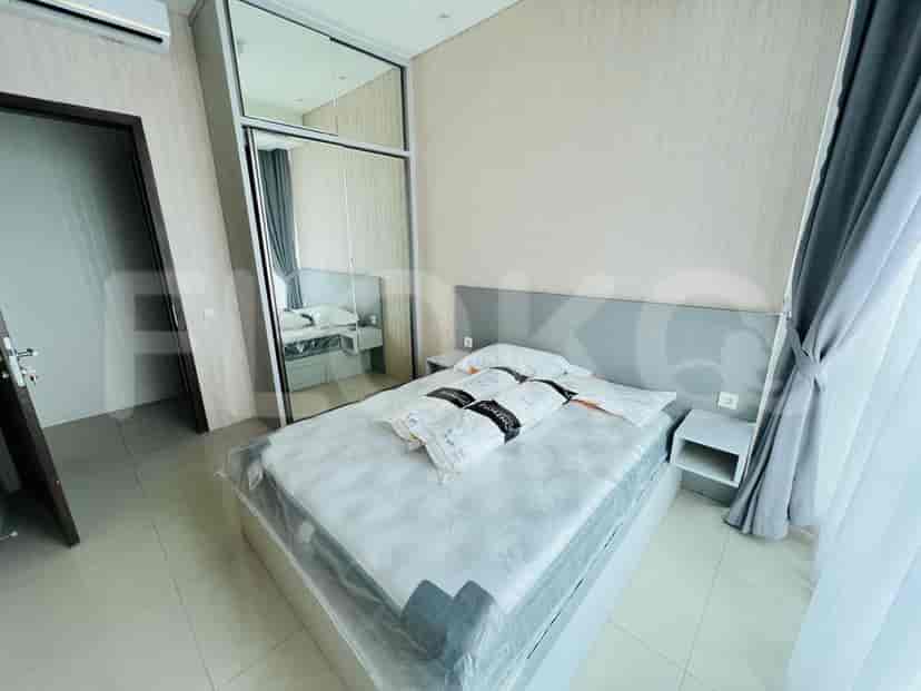 Cozy bedroom with a king-sized bed and modern design.