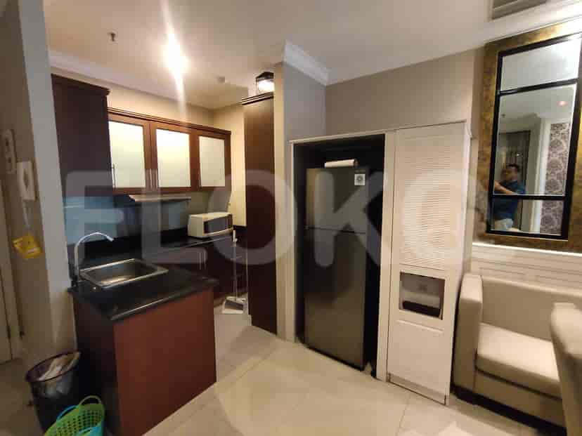 A fully equipped kitchen with cabinets and appliances.