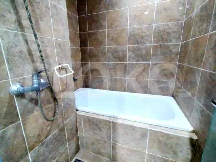 Bathroom featuring a bathtub.