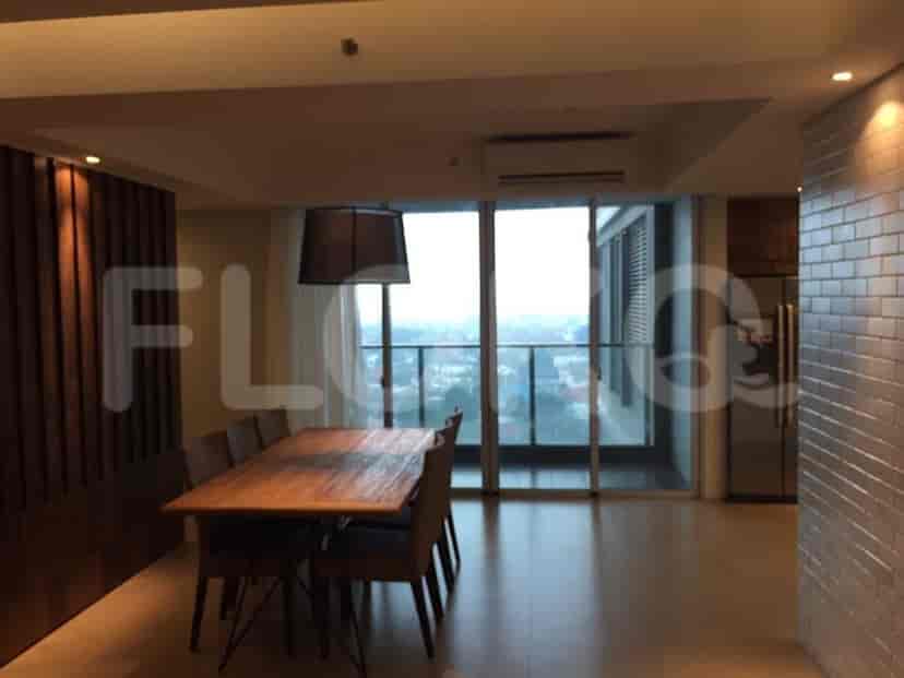 Living and dining space with a view of the city.