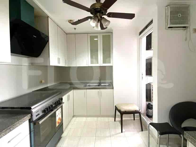 Kitchen with white cabinets and a gas stove.