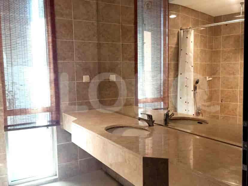 Bathroom with a double sink and shower.