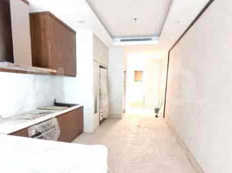 Kitchen area with cabinets, and open layout.