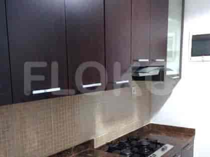 A modern bathroom with a walk-in shower, a bathtub, and a double vanity.