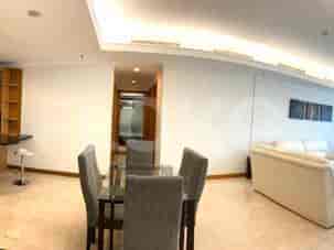 Dining area with a table and chairs.