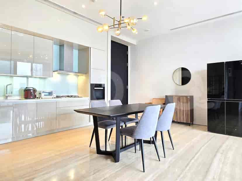 Open kitchen with dining table.