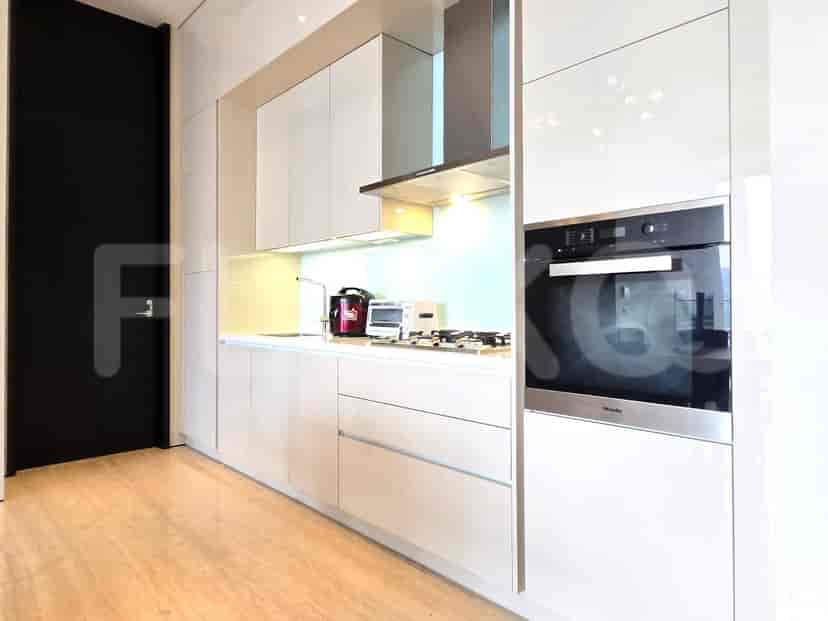 Modern kitchen with white cabinets.