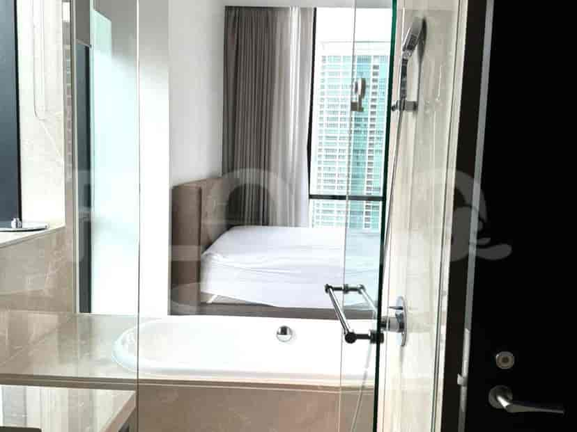 Bathroom with a bathtub and shower.