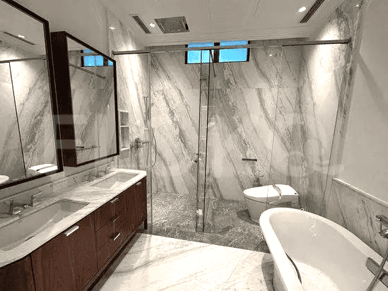 Another angle of the bathroom with vanity, shower and bathtub.
