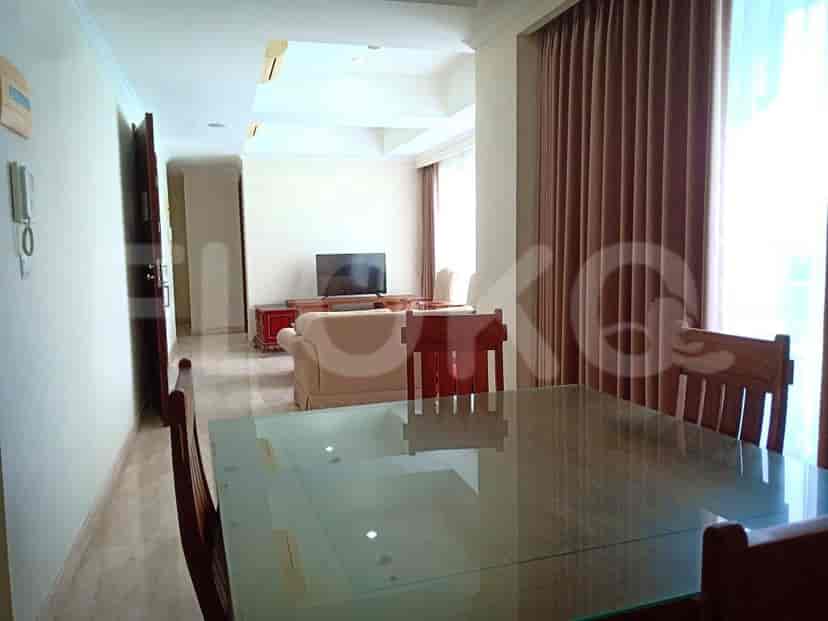 A living area with a dining area.
