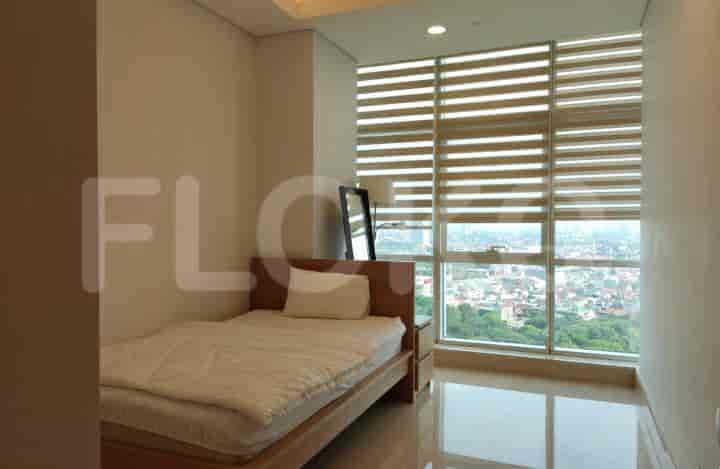 A bedroom featuring a single bed, large windows, and city views.