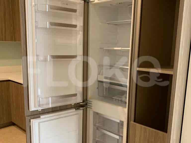 Kitchen with a refrigerator.