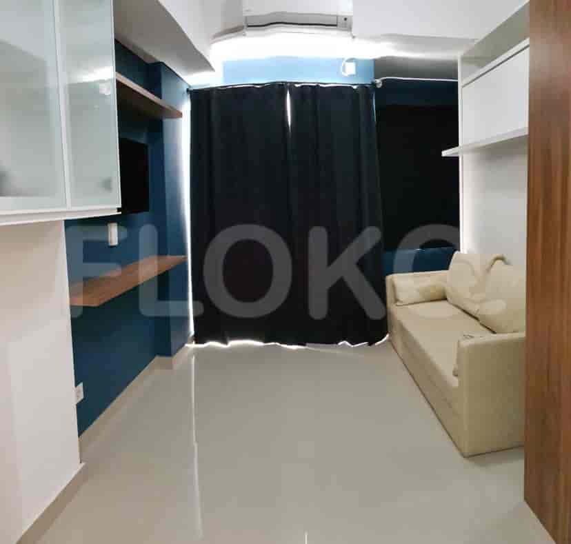 The living room shows the sofa and window.