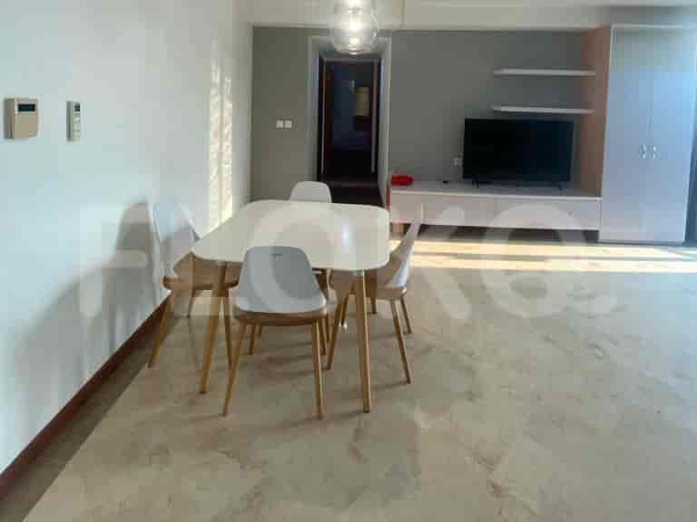 Dining area with a table and chairs.