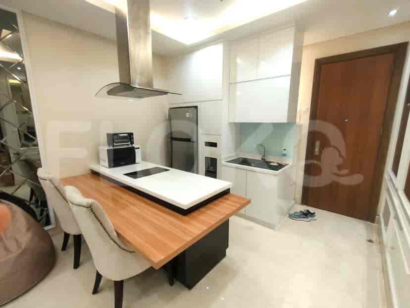 A modern kitchen with a breakfast bar.