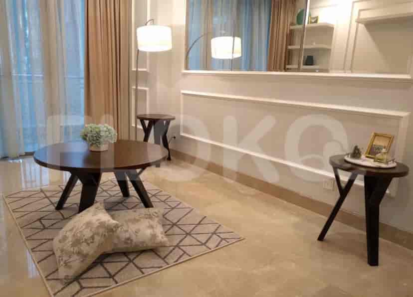 Living room setup with coffee table and side tables.