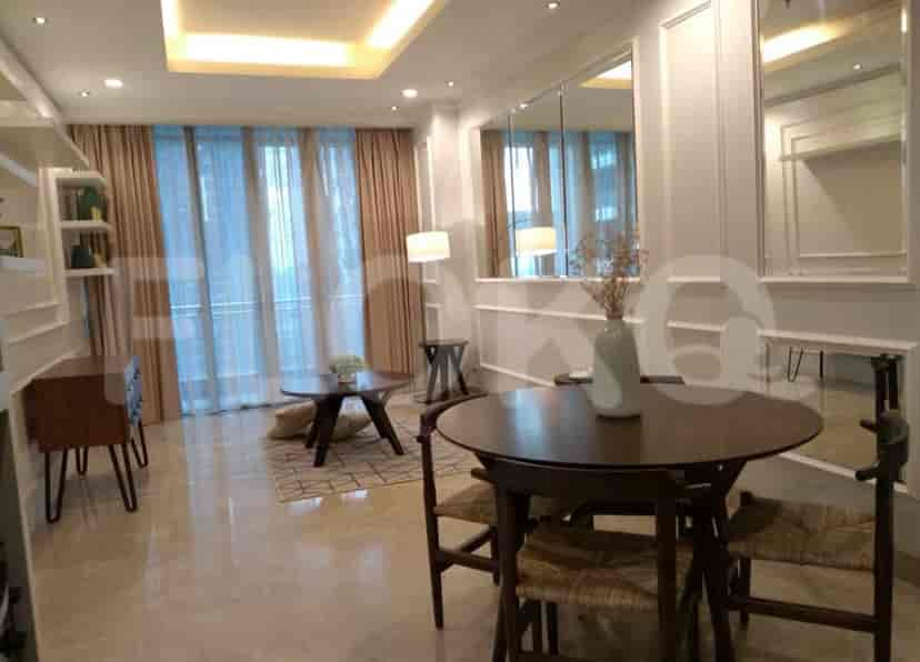 Living room setup with dining area.
