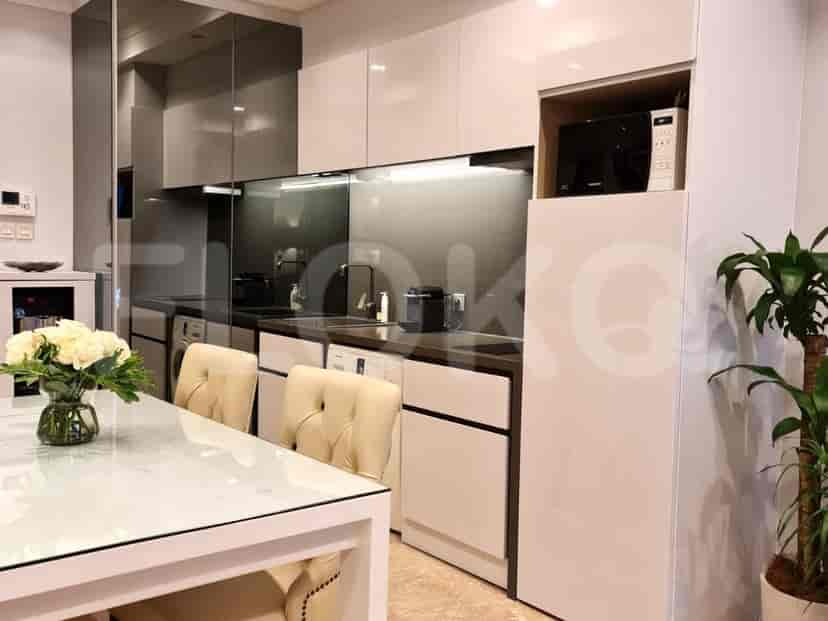 Modern kitchen with white cabinets.